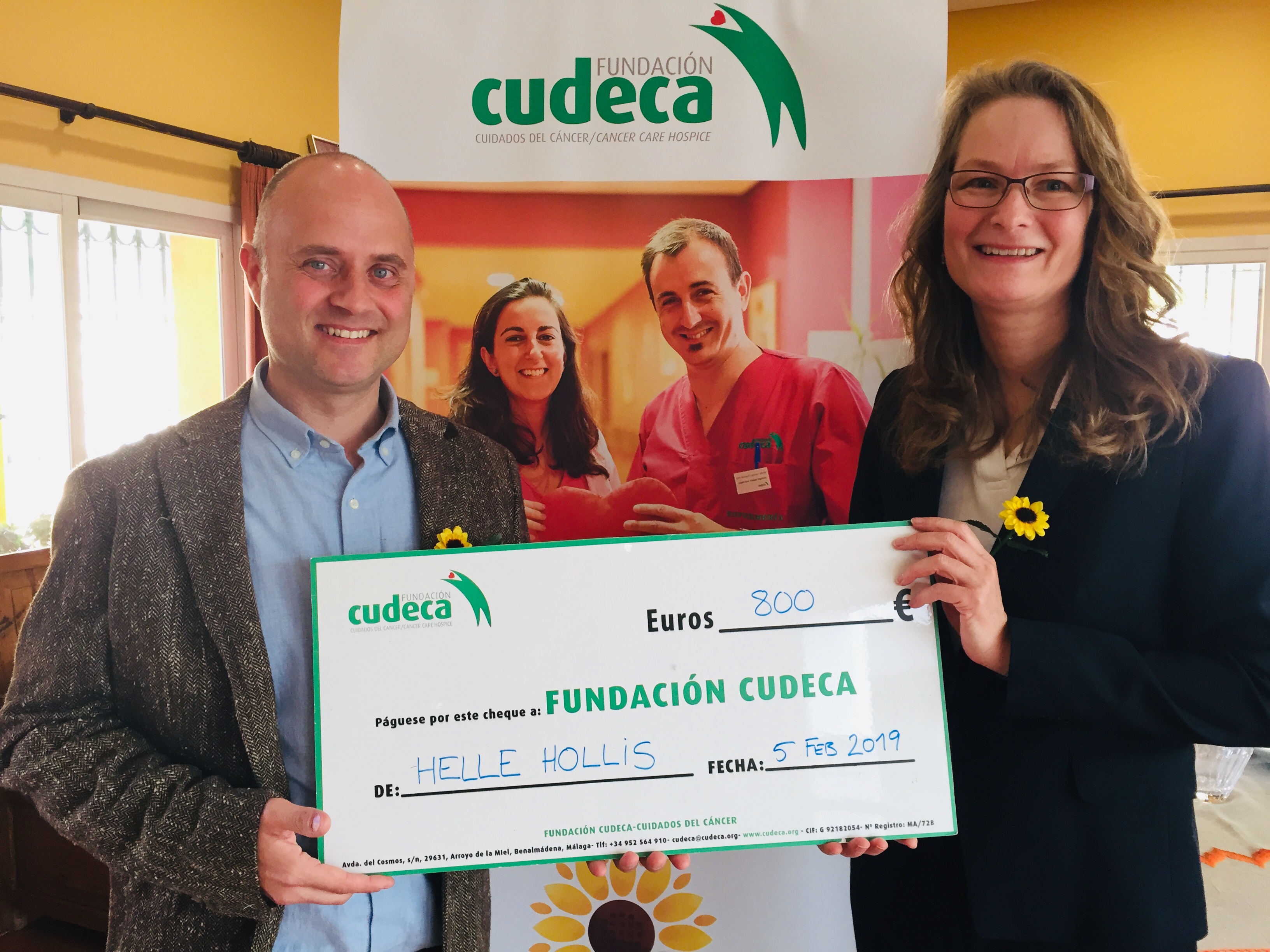 Helle Hollis presents cheque donation after 9 years helping CUDECA!