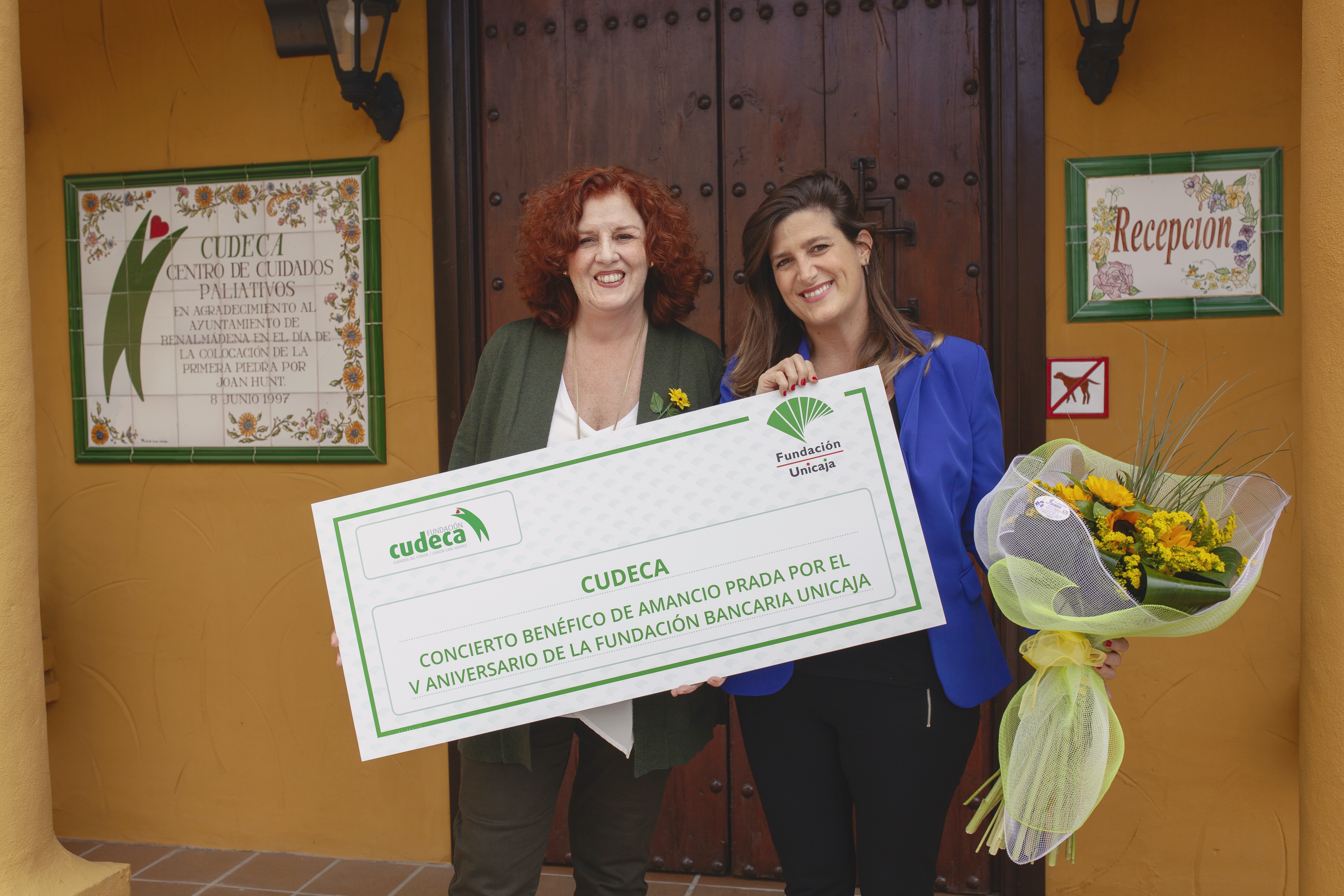 Charity cheque from Unicaja Foundation