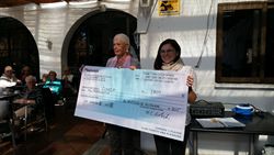Club Charity and Pleasure presents their Coffee morning event cheque in aid of Cudeca