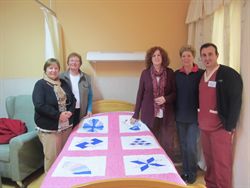 The Monday Club donates quilts for Cudeca Hospice