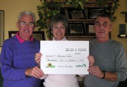 Dippers present cheque to Cudeca Hospice